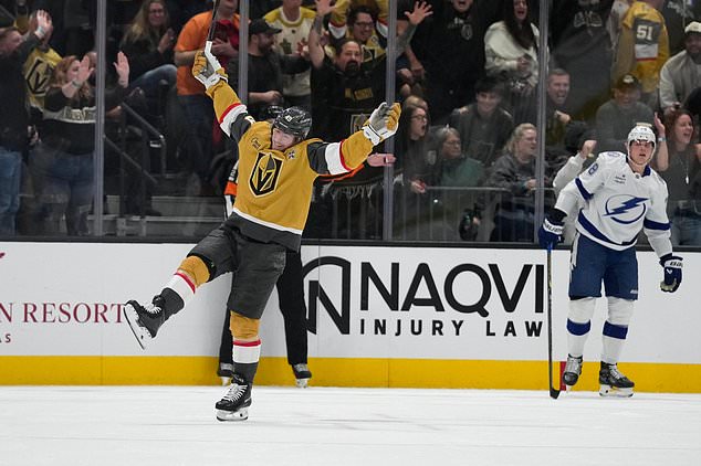 Vegas Golden Knights left wing Ivan Barbashev (49) celebrates after scoring against the Tampa Bay Lightning during the first period of an NHL hockey game Tuesday, Oct. 20, 2026, in Las Vegas. (AP Photo/John Locher)
