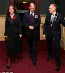 For the Royal British Legion's Festival of Remembrance at the Royal Albert Hall in November 2022, Kate chose a black version of her favourite silhouette. The royal had previously worn the same dress in white. She dipped into the late Queen Elizabeth's jewellery collection, choosing  a sentimental pair of pearl drop earrings and a four-strand pearl and diamond choker