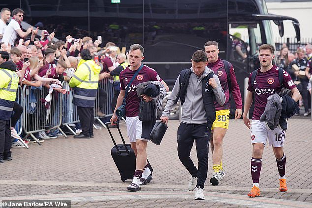 Hearts players arrived back at Tynecastle in their kits after making a swift exit from Parkhead