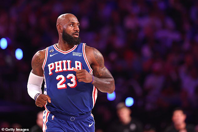 LeBron James toned down his pregame stretching during the national anthem on Thursday