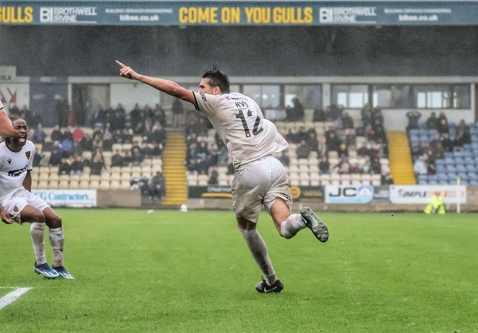 Frankie Hvid wheels away after scoring Maidstone's late leveller at Torquay. Picture: Helen Cooper