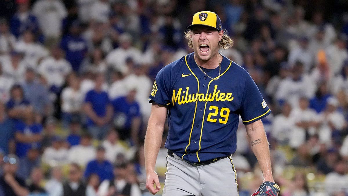 Trevor Megill celebrates after the Brewers beat the Dodgers.