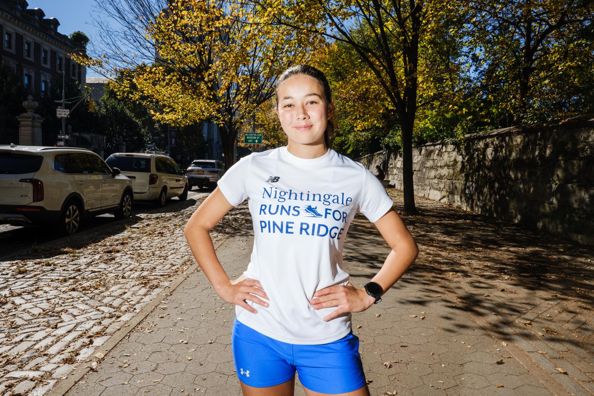 Lucy Weld, 17, poses by the reservoir on the east side of Central Park in New York, Friday, Oct. 23, 2026. Weld, a student at Nightingale Bamford in Manhattan, will be running the New York City Marathon on Nov. 1, 2026, which happens to be her 18th birthday.