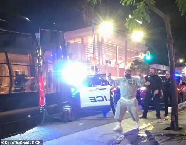 A separate clip shows Broner with his arms raised and walking backwards towards a pair of officers, who ultimately placed him in handcuffs on the streets of Beverly Hills