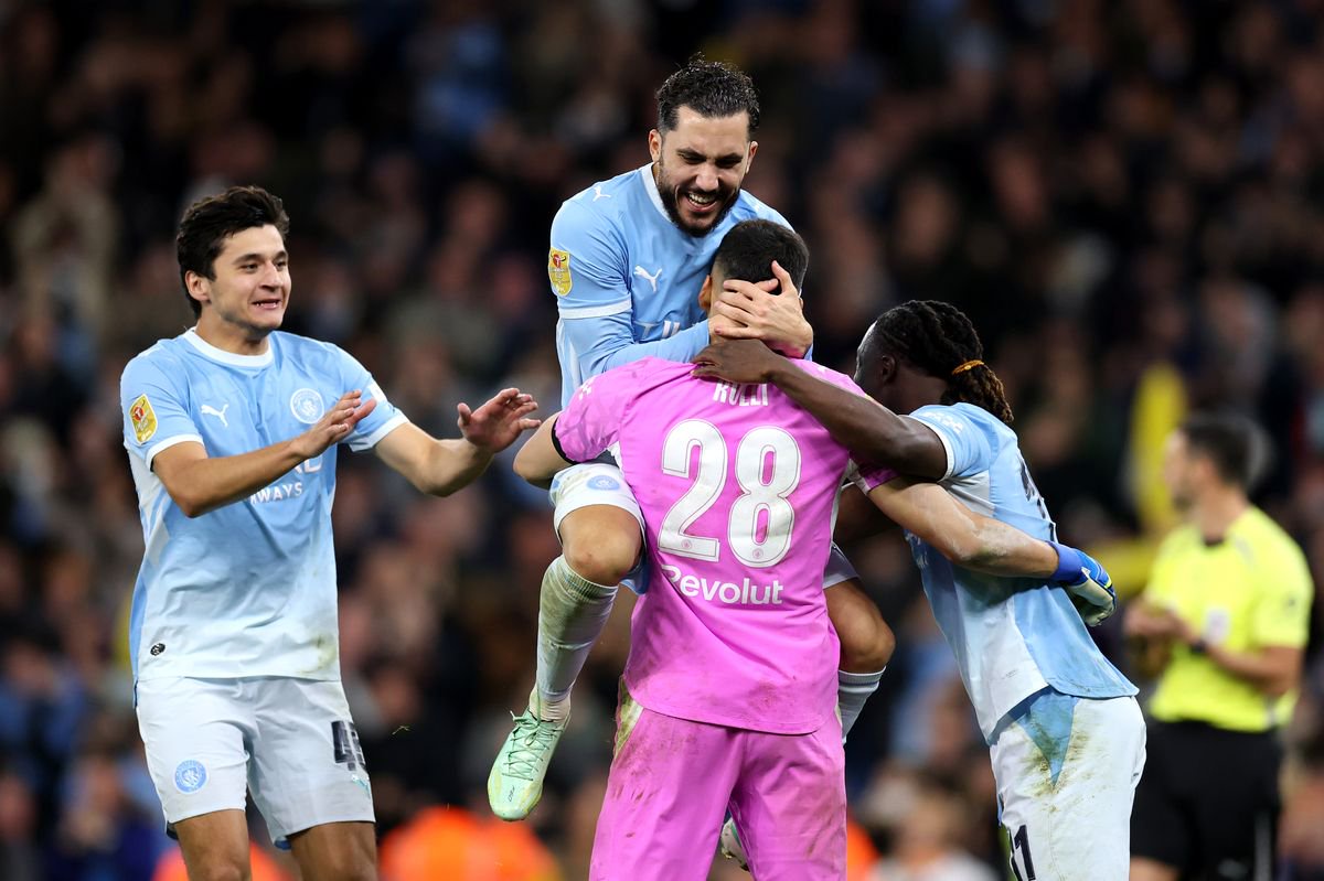Manchester City celebrate beating Brighton on penalties in the Carabao Cup fourth round