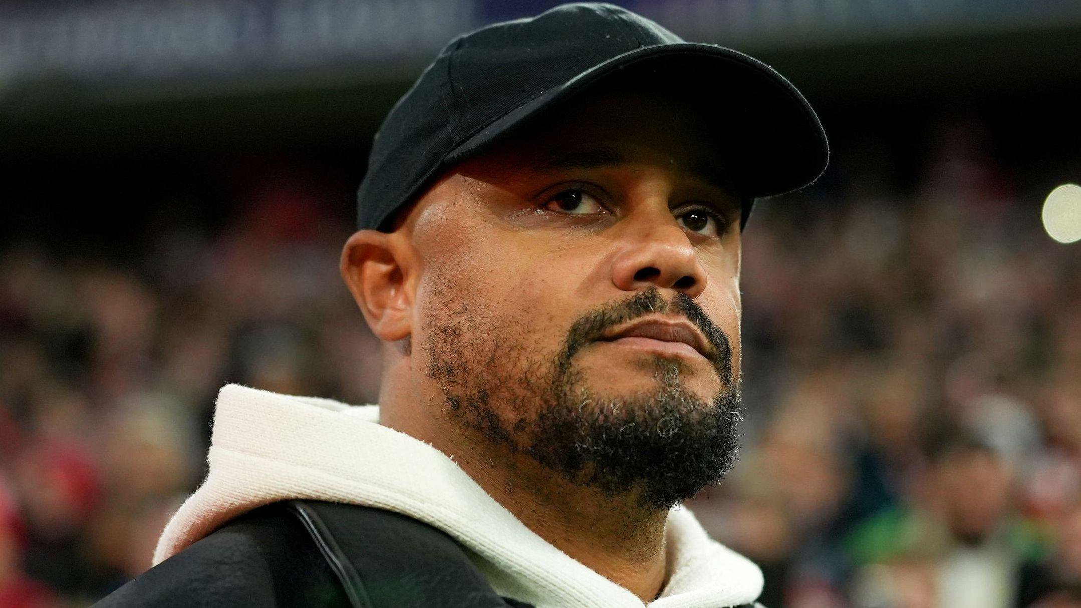 Vincent Kompany watches on during Bayern Munich's Champions League match against Arsenal