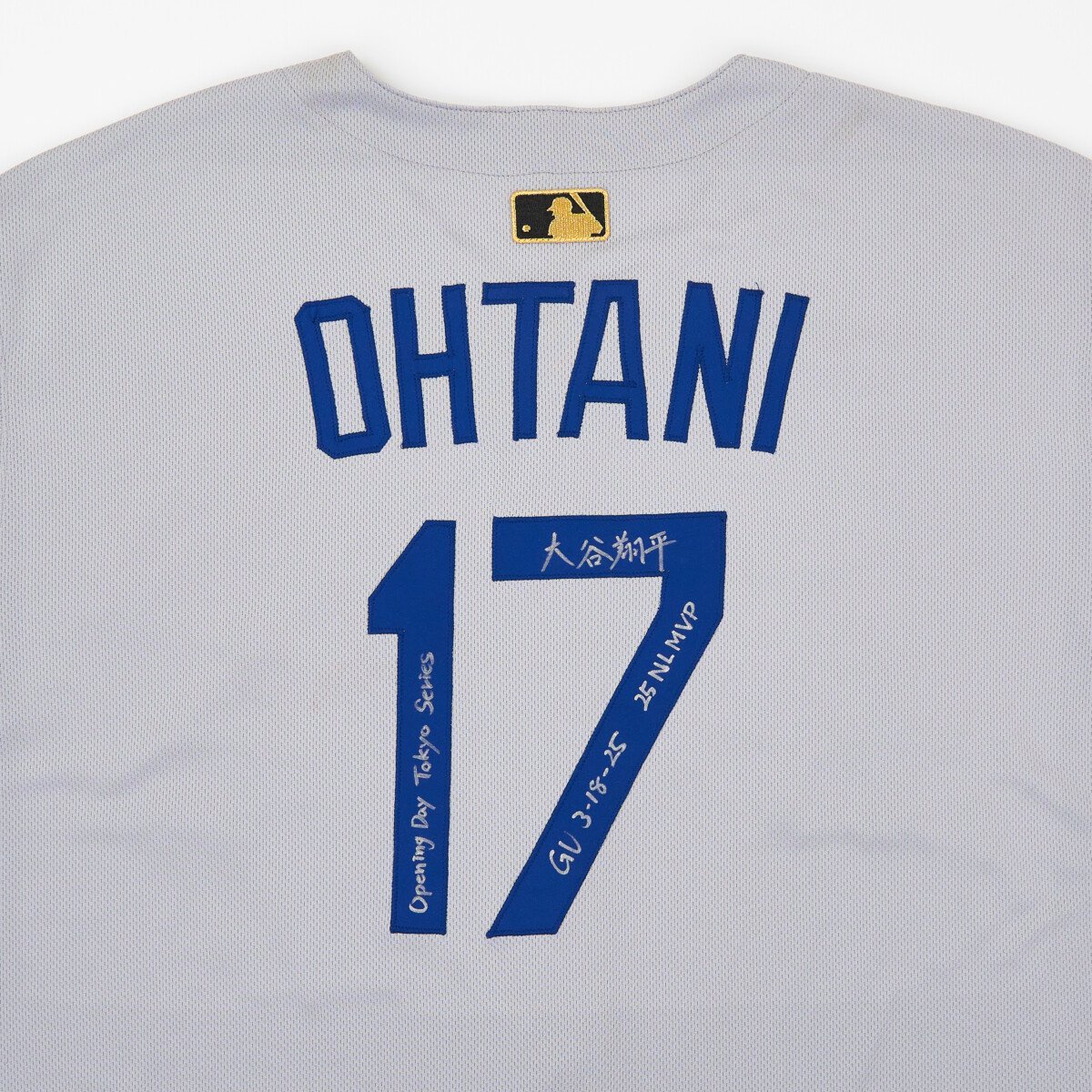 Shohei Ohtani autographed the back of his jersey from the Tokyo Series