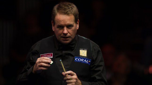 BELFAST, NORTHERN IRELAND - NOVEMBER 15: Joe Swail of Northern Ireland chalks the cue during the first round match against Dominic Dal of Wales on day two of Coral Northern Ireland Open 2016 at Titanic Exhibition Centre on November 15, 2016 in Belfast, Northern Ireland. (Photo by Visual China Group via Getty Images/Visual China Group via Getty Images)
