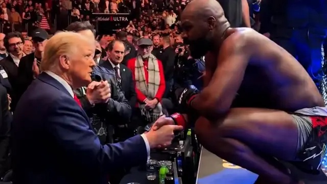 Jon Jones gives UFC championship belt to Donald Trump