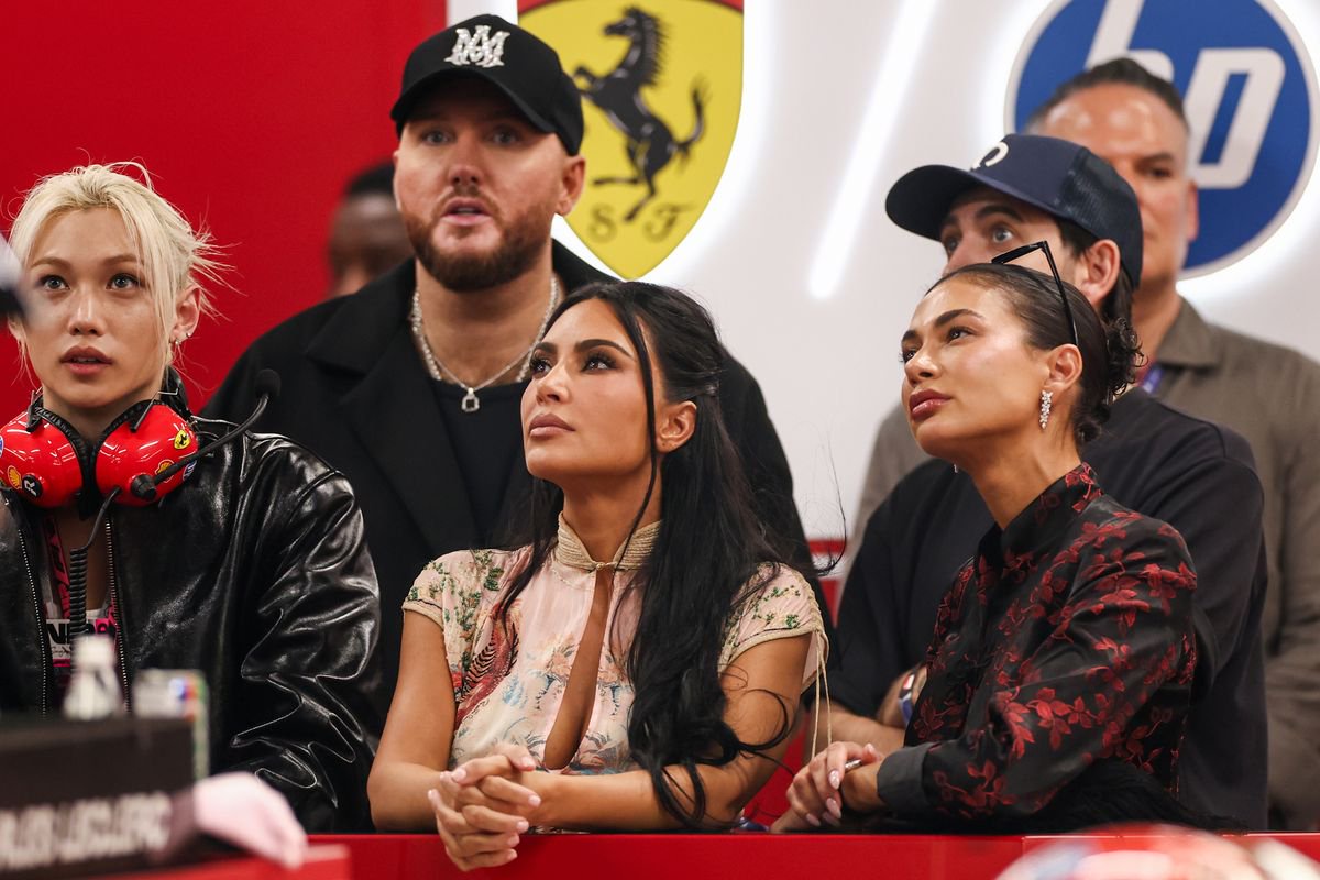 Kim watches Lewis from the crowd in Singapore