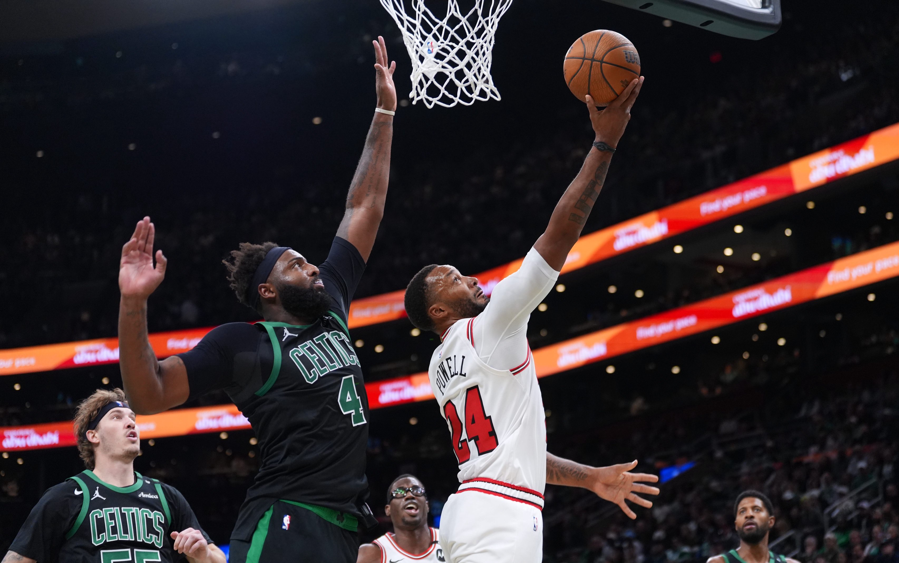 Oct 30, 2026; Boston, Massachusetts, USA; Chicago Bulls guard Norman Powell (24) drives the ball to the basket against Boston Celtics center Mitchell Robinson (4) in the second half at TD Garden. Mandatory Credit: David Butler II-Imagn Images