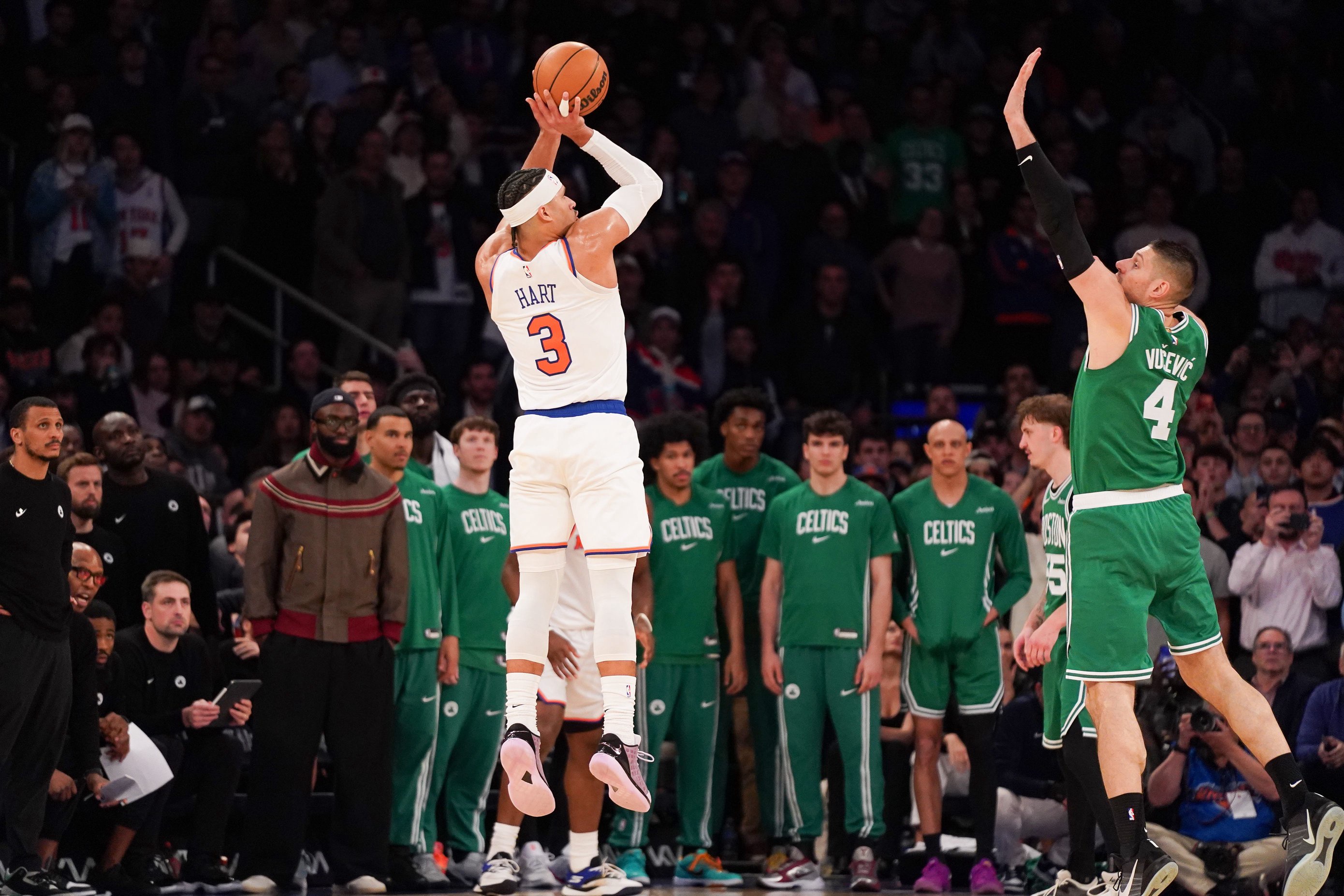 Apr 9, 2026; New York, New York, USA; New York Knicks guard Josh Hart (3) hits a three pointer late in the fourth quarter against the Boston Celtics at Madison Square Garden. Mandatory Credit: Lucas Boland-Imagn Images