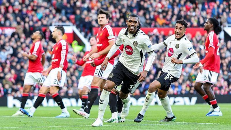 Rayan celebrates scoring for Bournemouth against Manchester United