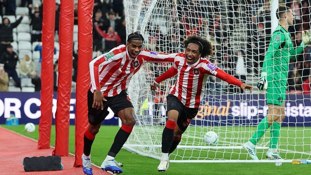 Malick Fofana of Sunderland celebrates with his team-mate Dayann Methalie