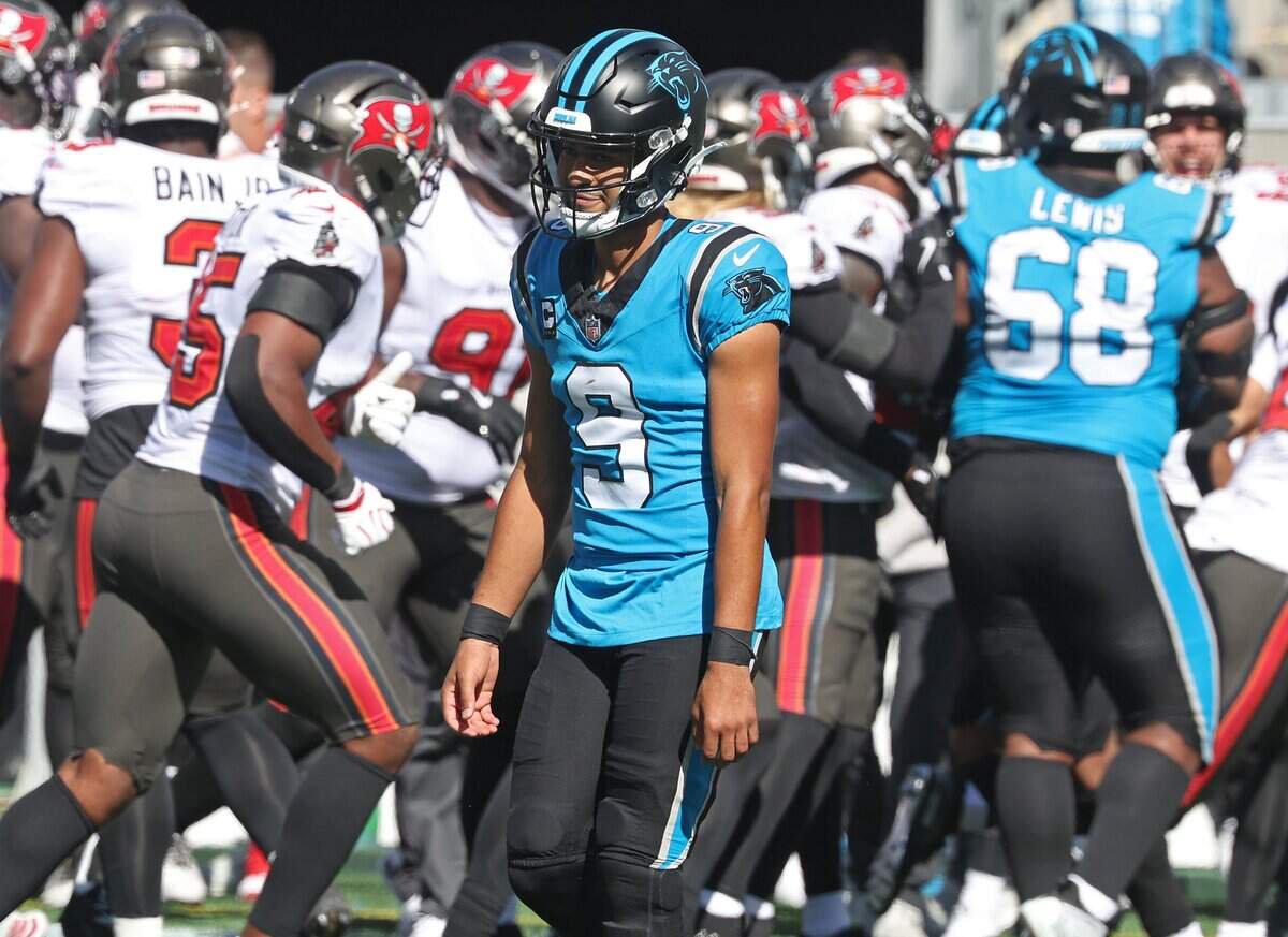 Carolina Panthers quarterback Bryce Young walks off the field dejected after throwing an interception pass to Tampa Bay Buccaneers cornerback Zyon McCollum during action at Bank of America Stadium in Charlotte, NC on Sunday, October 25, 2026.