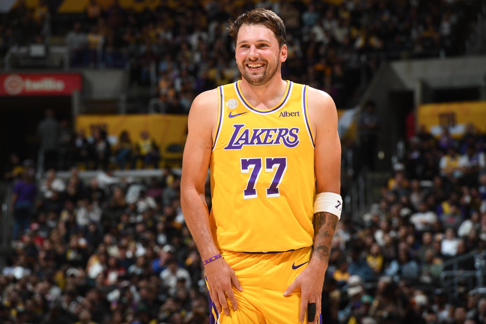 Luka Doncic (77) of the Los Angeles Lakers smiles against the Golden State Warriors during a game at Chase Center in San Francisco, California, Wednesday, Oct. 21, 2026.