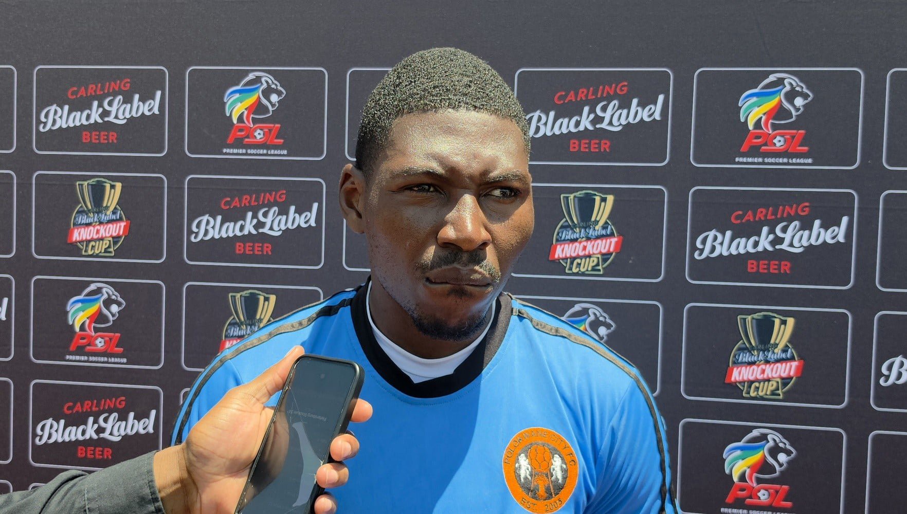 Manuel Kambala talking to the media at the Old Peter Mokaba Stadium.