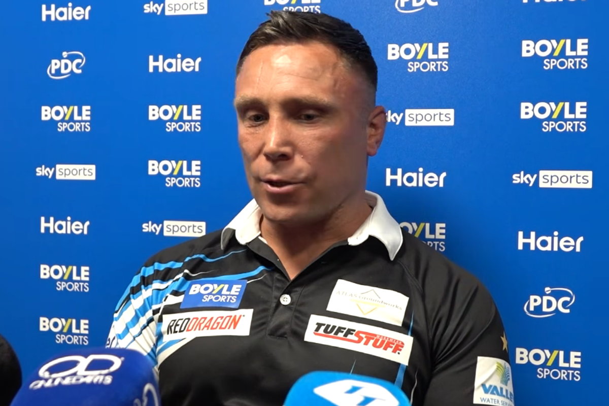 Gerwyn Price speaks during a press conference