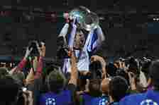 Petr Cech celebrates with the Champions League trophy after Chelsea won the final in 2013
