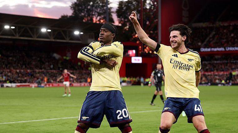 Noni Madueke celebrating his goal against Nottingham Forest with Declan Rice