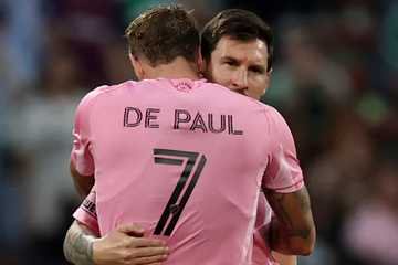 Rodrigo De Paul and Lionel Messi