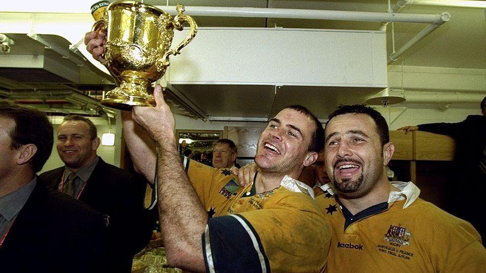 David Wilson lifts the Rugby World Cup with Michael Foley