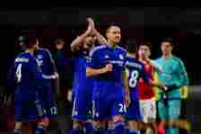 John Terry of Chelsea celebrates with his team-mates after the Barclays Premier League match between Arsenal and Chelsea at Emirates Stadium on Jan...