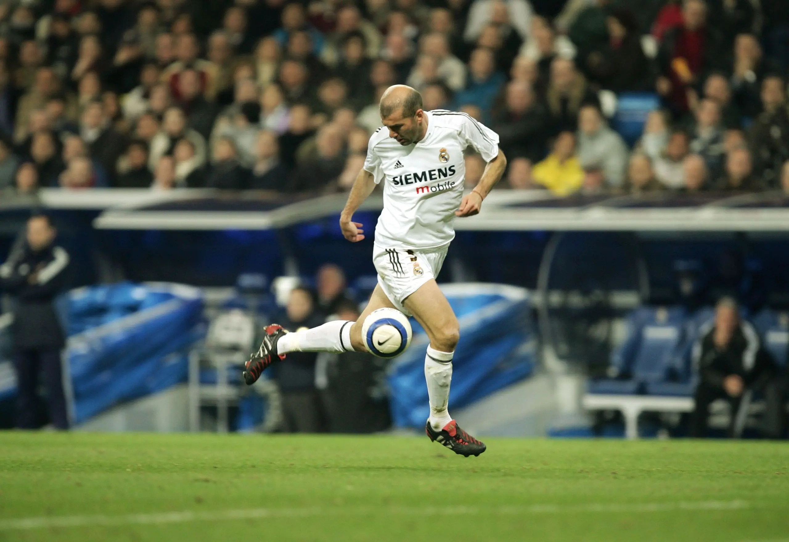 Real Madrid's Zinedine Zidane controls the ball during a La Liga soccer match between Real Madrid and Athletic Bilbao