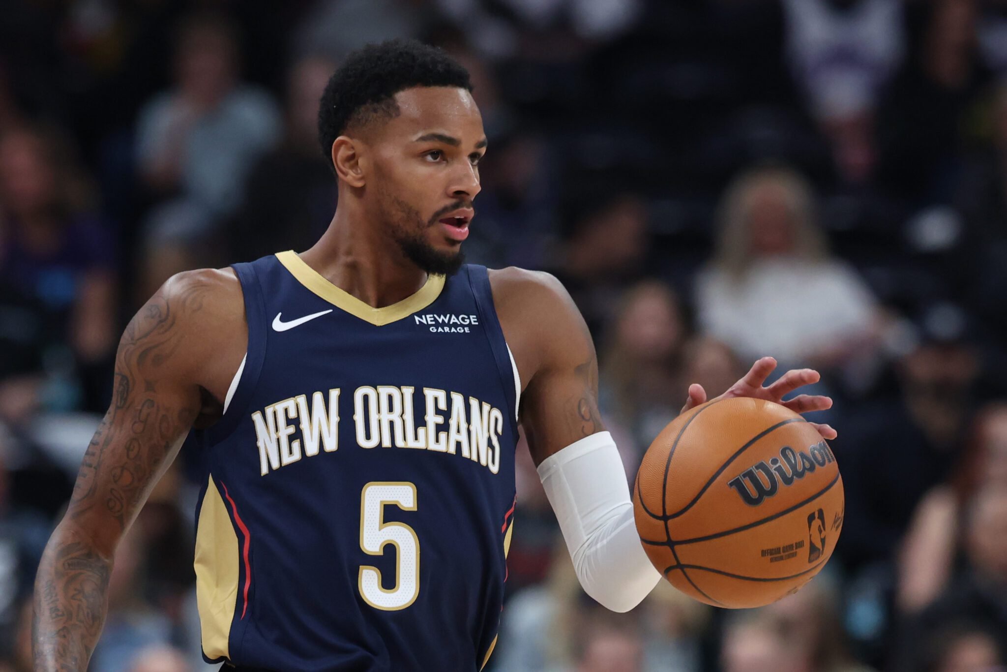 Oct 23, 2026; Salt Lake City, Utah, USA; New Orleans Pelicans guard Dejounte Murray (5) brings the ball up the court against the Utah Jazz during the first half at Delta Center. Mandatory Credit: Rob Gray-Imagn Images