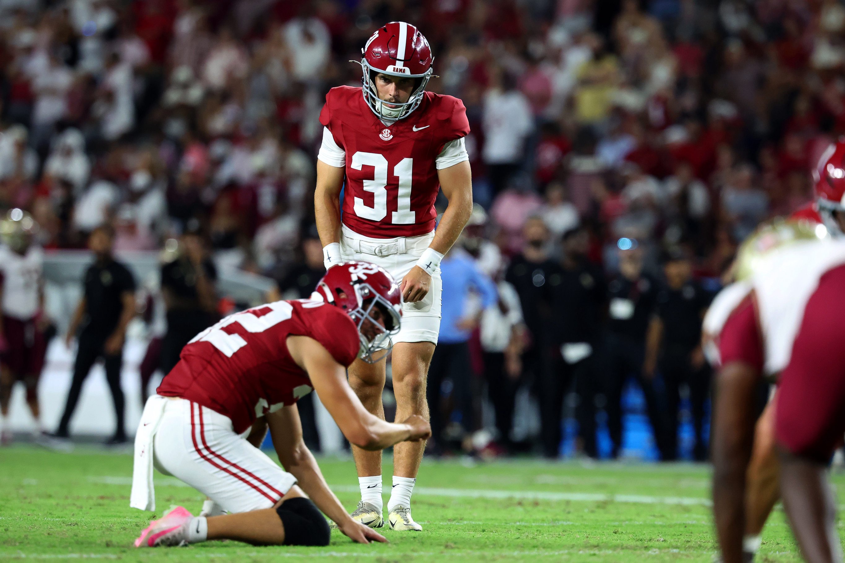 Sep 19, 2026; Tuscaloosa, Alabama, USA; Alabama Crimson Tide kicker Conor Talty (31) kicks the ball during the second quarter against the Florida State Seminoles at Saban Field at Bryant-Denny Stadium. Mandatory Credit: David Leong-Imagn Images