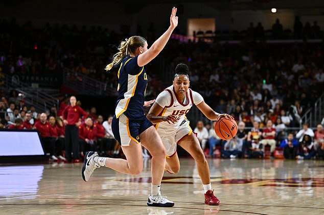 Southern California guard Juju Watkins, right, drives the ball while under pressure from California forward Zara Russell during the first half of an NCAA college basketball exhibition game Sunday, Oct. 25, 2026, in Los Angeles. (AP Photo/William Liang)