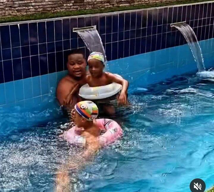 "Biggy And Sons" - Young Billionaire, Cubana Chief Priest Says As He Was Swimming With His Children 2c69d5e331134390974b7d91880245af?quality=uhq&format=webp&resize=720