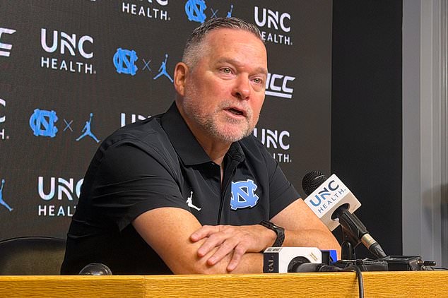 FILE - In this photo taken with a smartphone, North Carolina men's basketball head coach Michael Malone speaks during a news conference Thursday, Sept. 3, 2026, in Chapel Hill, N.C. (AP Photo/Aaron Beard,File)