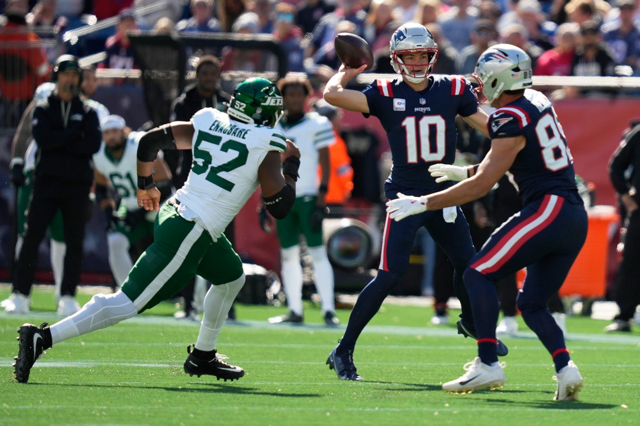 New England Patriots quarterback Drake Maye (10) stands back to pass during the first half of an NFL football game against the New York Jets in Foxborough, Mass., Sunday, Oct. 18, 2026.