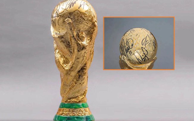 Troféu erguido por Messi em 2022 foi autografado por oito jogadores e será colocado à venda em leilão 