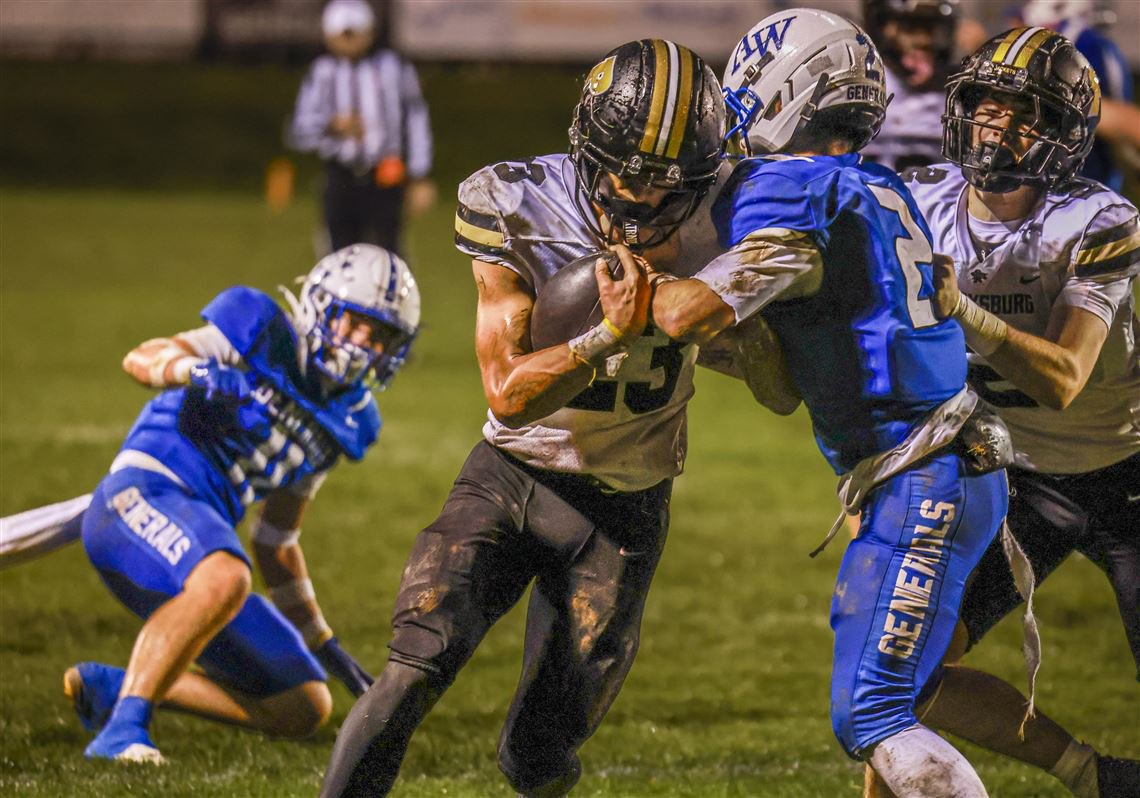 Perrysburg RB Dakota Jackson sheds Anthony Wayne’s Braiden Scicere in a high school football game at Schaller Memorial Stadium on Oct. 16 in Whitehouse.
