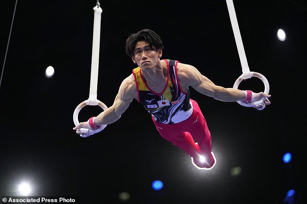Daiki Hashimoto, of Japan, competes in the rings during the men's all-around final at the Artistic Gymnastics World Championships in Rotterdam, the Netherlands, Thursday, Oct. 22, 2026. (AP Photo/Francisco Seco)