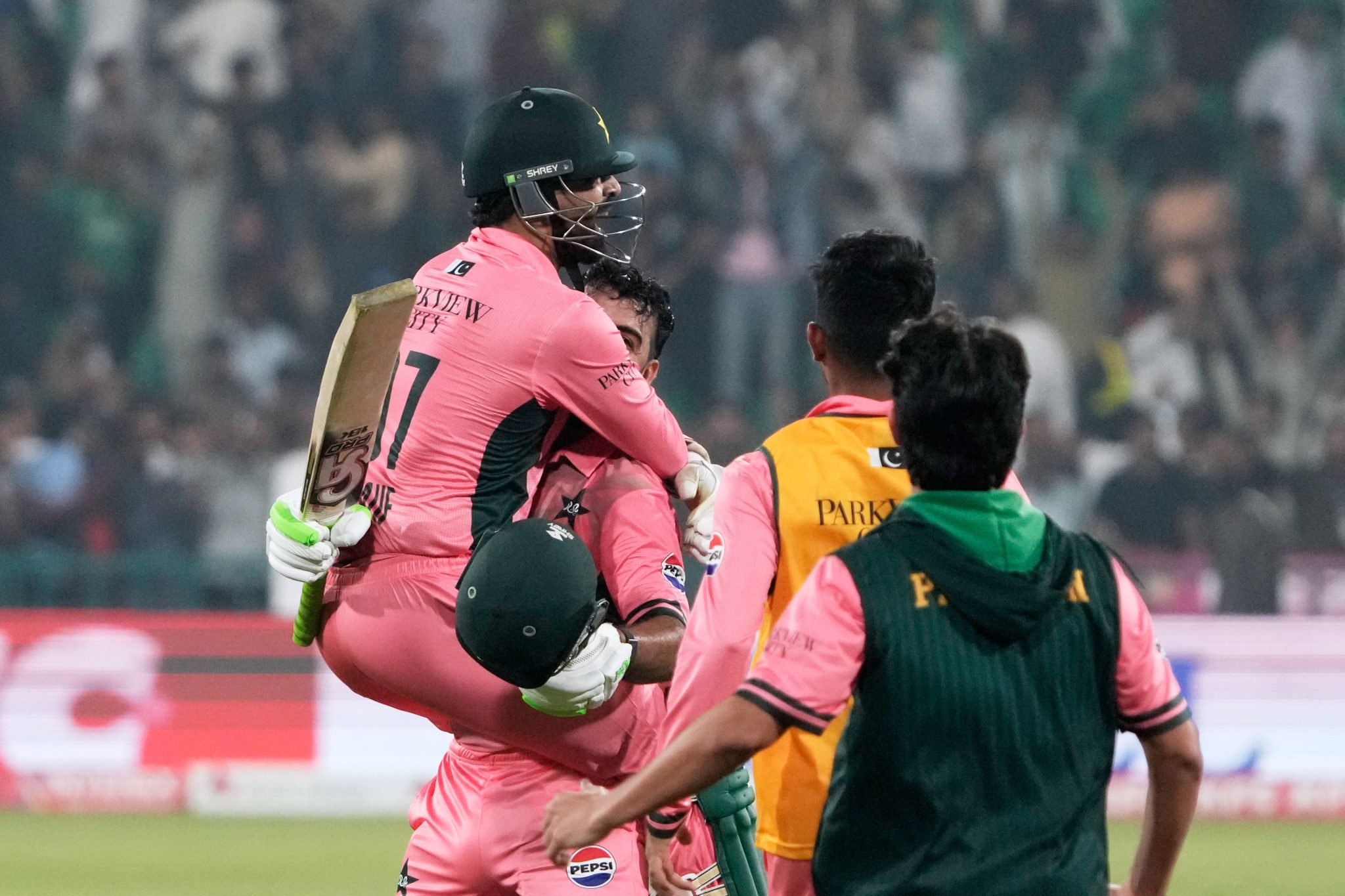 Shadab Khan and Haris Rauf celebrate Pakistan’s triumph.