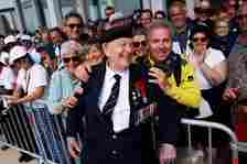 The crowd hailed the veterans - the last of the generation that saved the world