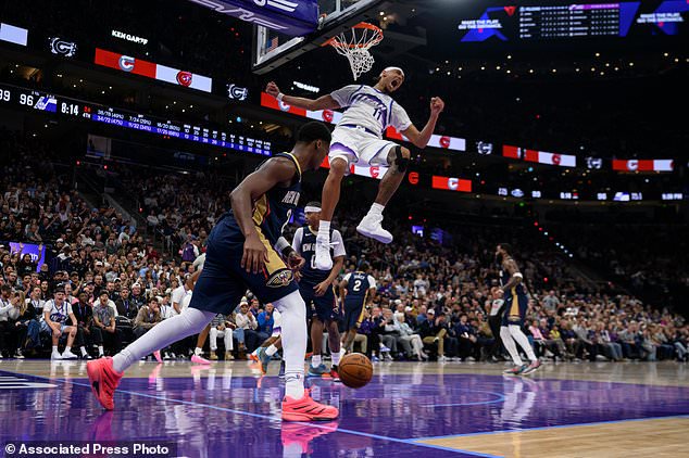 Utah Jazz center Jaxson Hayes (11) yells after a dunk during an NBA basketball game against the New Orleans Pelicans, Friday, Oct. 23, 2026, in Salt Lake City. (AP Photo/Tyler Tate)