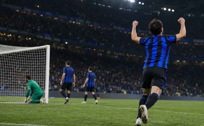 Visiting striker celebrates a decisive goal as Inter players react at San Siro