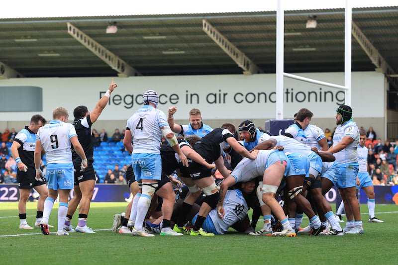 Glasgow Warriors' forwards go over the line for Scott Cummings to score a try. Photograph: Bryan Keane/Inpho