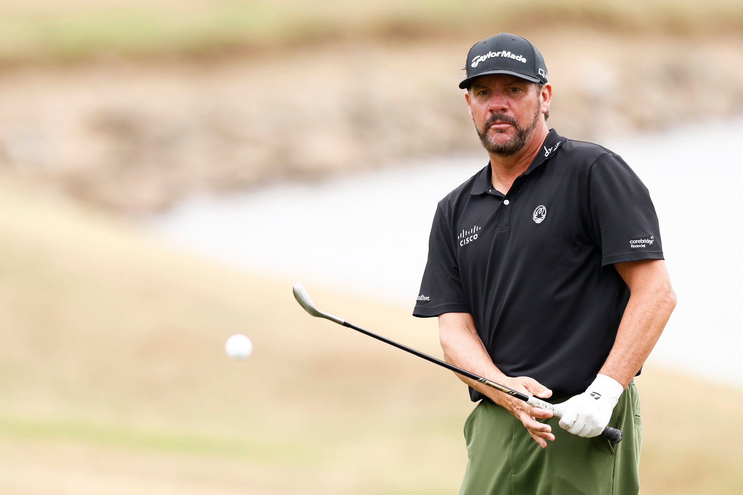 Michael Block plays his shot from the 18th rough during the first round of the Simmons Bank Championship 2026 at Pleasant Valley Country Club in Little Rock, Arkansas. 