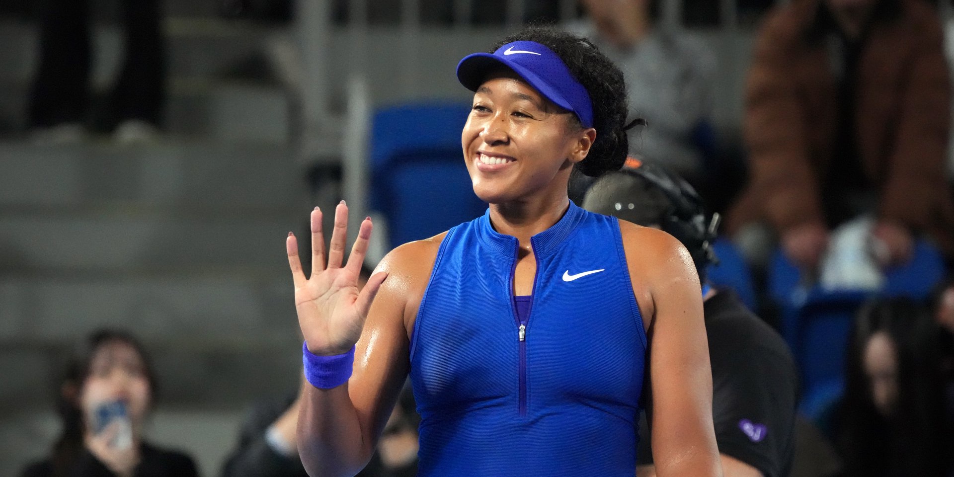 Osaka unveils crane outfit in Tokyo before win over Paolini