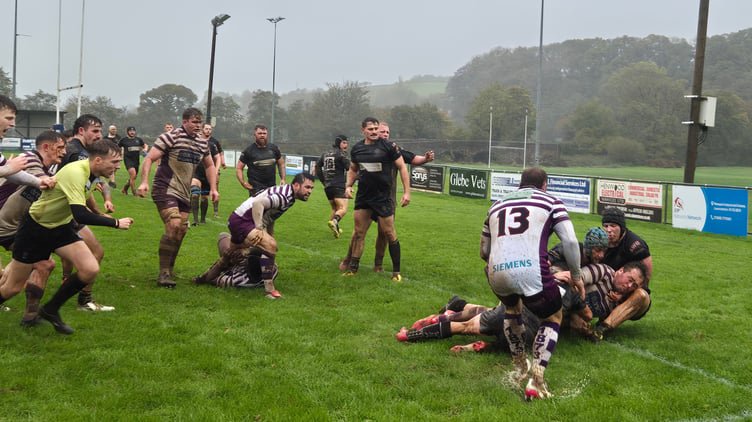 Launceston's defence look to prevent a try. 