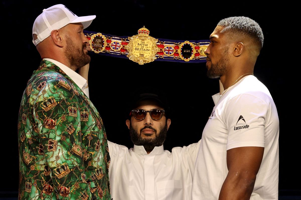 British heavyweight boxers Tyson Fury (L) and Anthony Joshua face off in Cardiff
