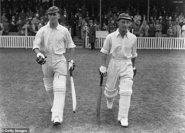 Len Hutton (right) walks out to bat against Australia at the Oval in 1938. He would go on to break the world record for most runs in a Test innings, with 364