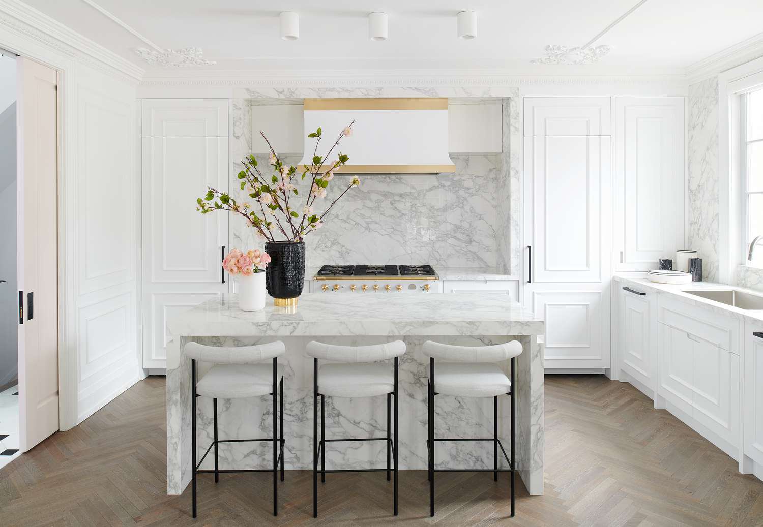 white cabinets with molding
