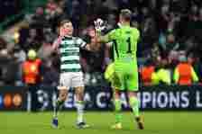 Alistair Johnston and Joe Hart of Celtic celebrate following the team's victory during the UEFA Champions League match between Celtic FC and Feyeno...