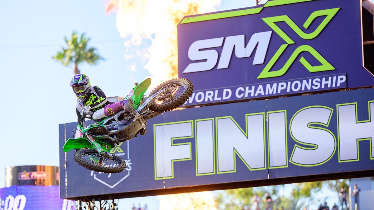 Levi Kitchen jumping on dirtbike at SMX World Championship finish line